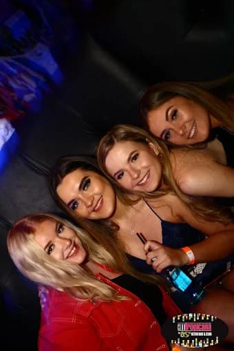 Group celebrating with cocktails